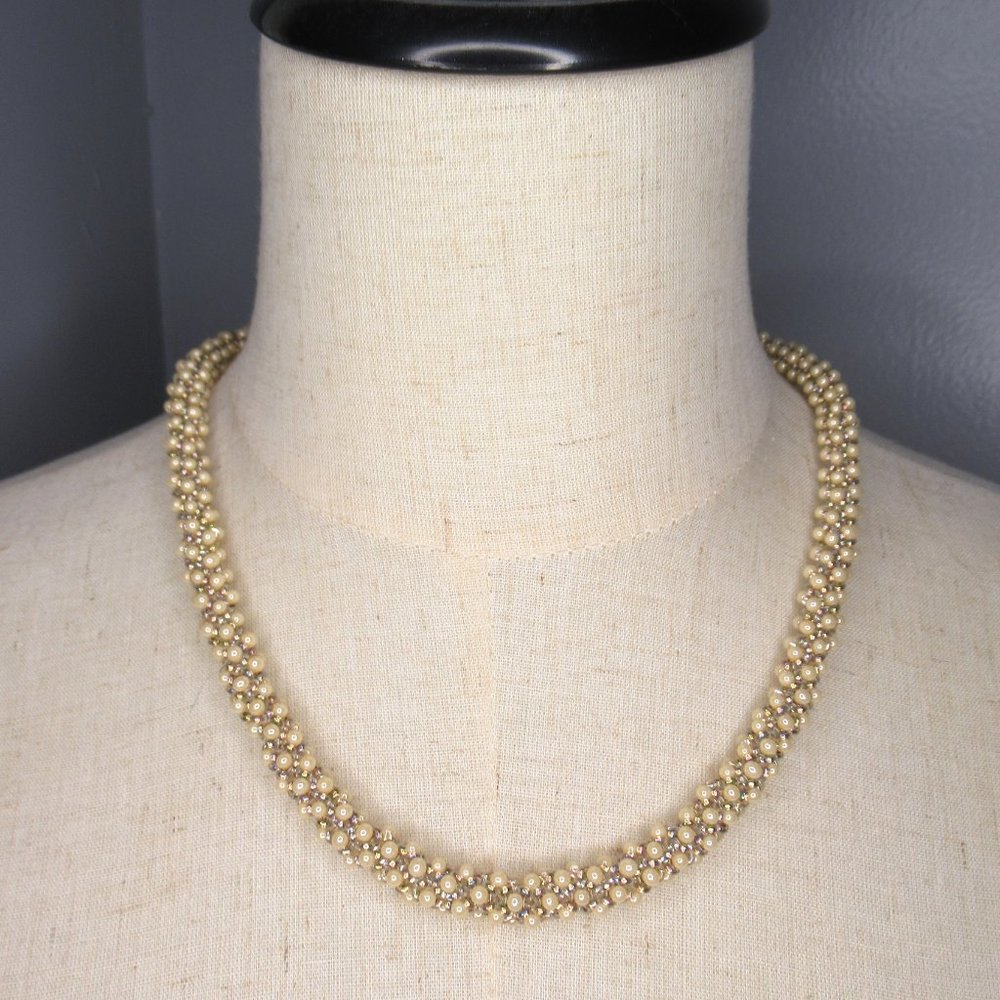 Hand stitched drop necklace